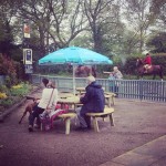 May: People enjoying the sunshine in the garden
