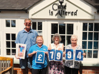 Photo of Our Volunteers with an Alzheimer's Charity Rep