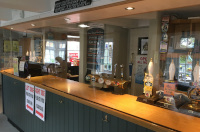 Covid Safeguards - Pub Interior with Transparent Screens around the Bar